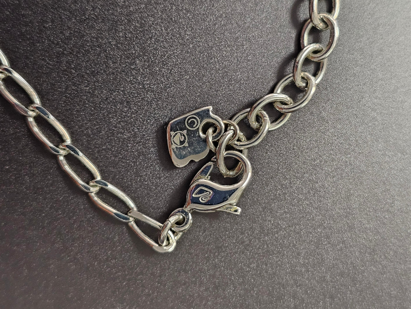 Swarovski Kette mit lila und glasklaren Swarovski Kristallen bestückt