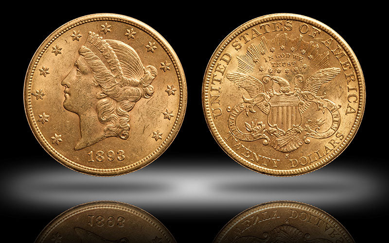 Zwei Goldmünzen mit dem Prägejahr 1893 werden gezeigt. Man sieht die Prägung: United States of America - twenty dollars